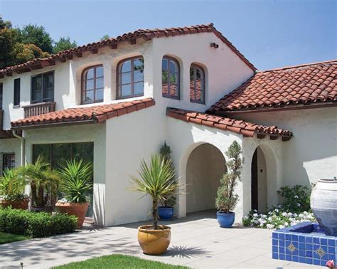 spanish style house with metal roof|restored spanish style homes.